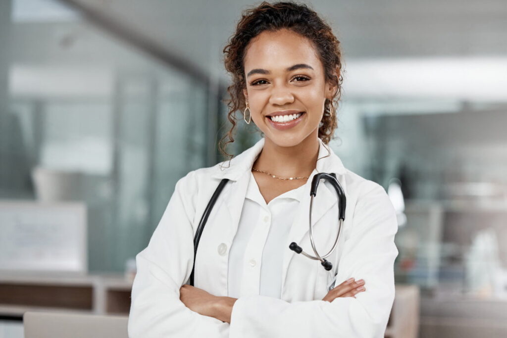 Dr. ABC, the best psychiatrist in chandigarh wearing white coat and stethoscope smiling